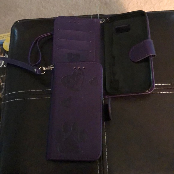 Two Samsung 5or 6 Leather phone cases.